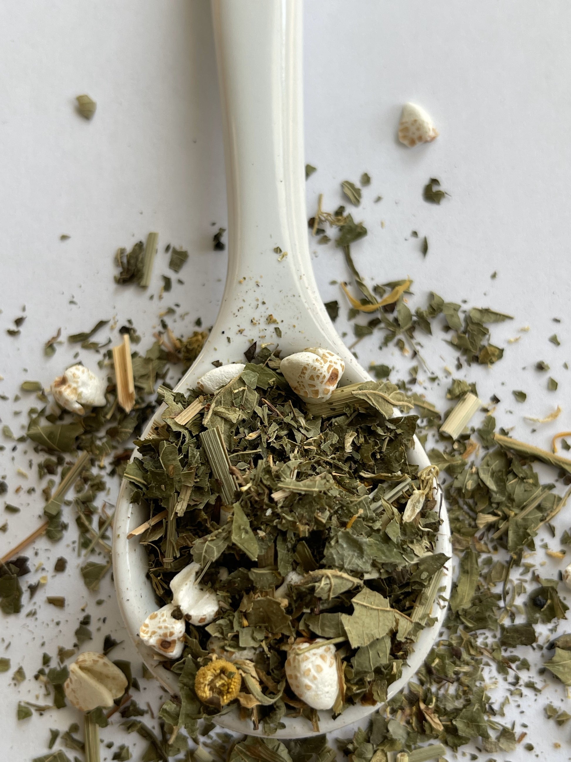 CBD tea blend with strawberry leaves, chamomile, lemon balm, popped buckwheat, lemongrass, and rose petals.